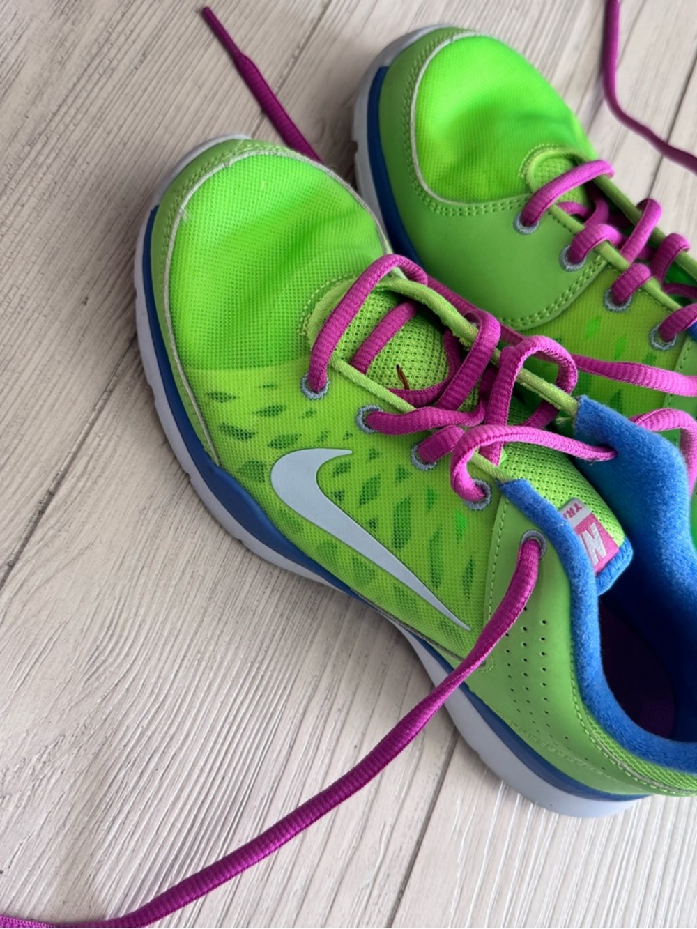 Nike women’s Neon Green Sneakers with Pink Laces